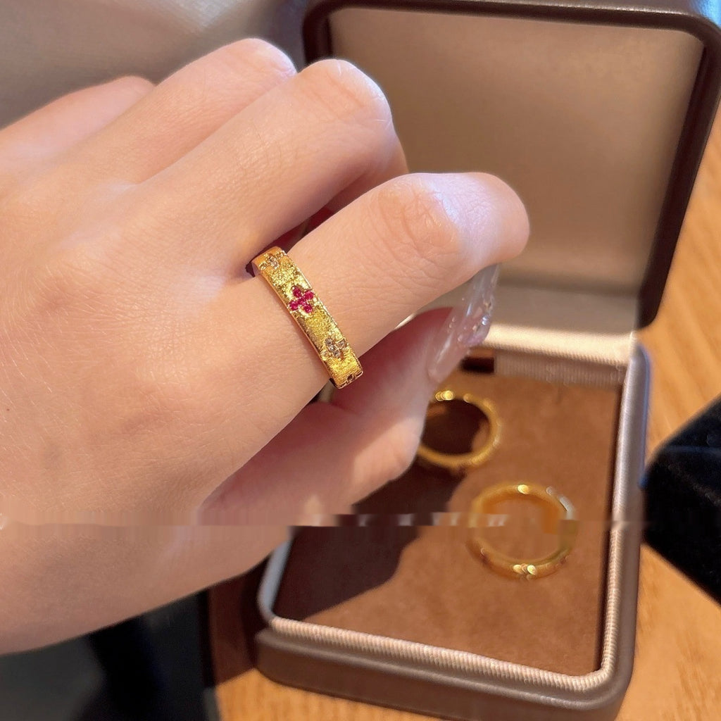 Alluvial Gold Brushed Four-petal Open Zircon Ring