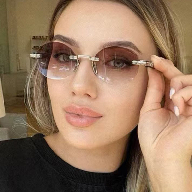 Women's All-match Frameless Trimming Oval Sunglasses